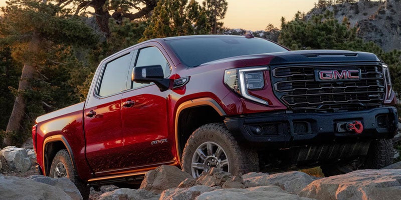 New GMC Sierra 1500 off-roading on rocky terrain